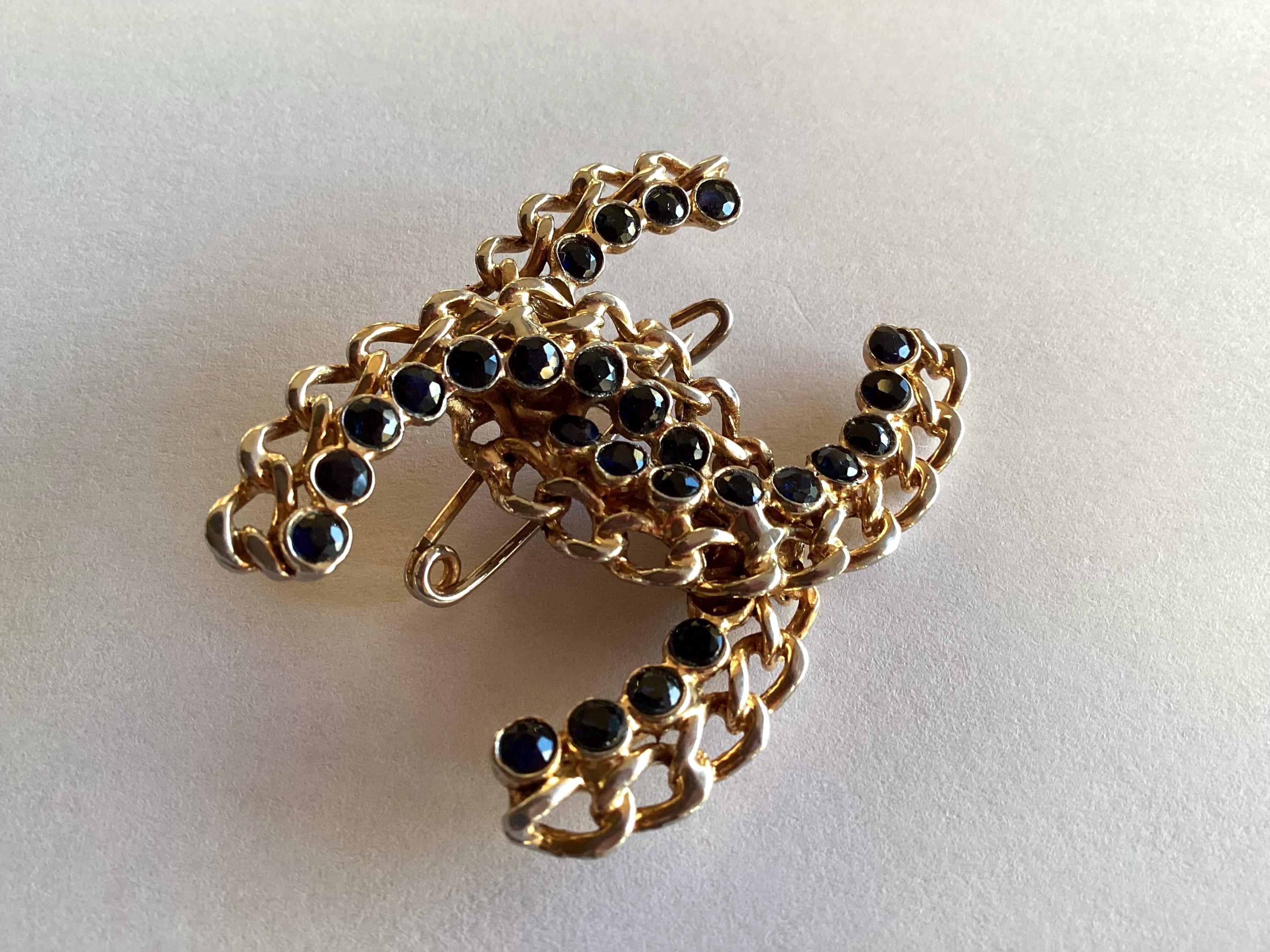 Vintage Chanel Logo Brooch | Intertwined Double C Sapphire, Two-Tone Gold Plated Early 1950s — photo 3 of 11