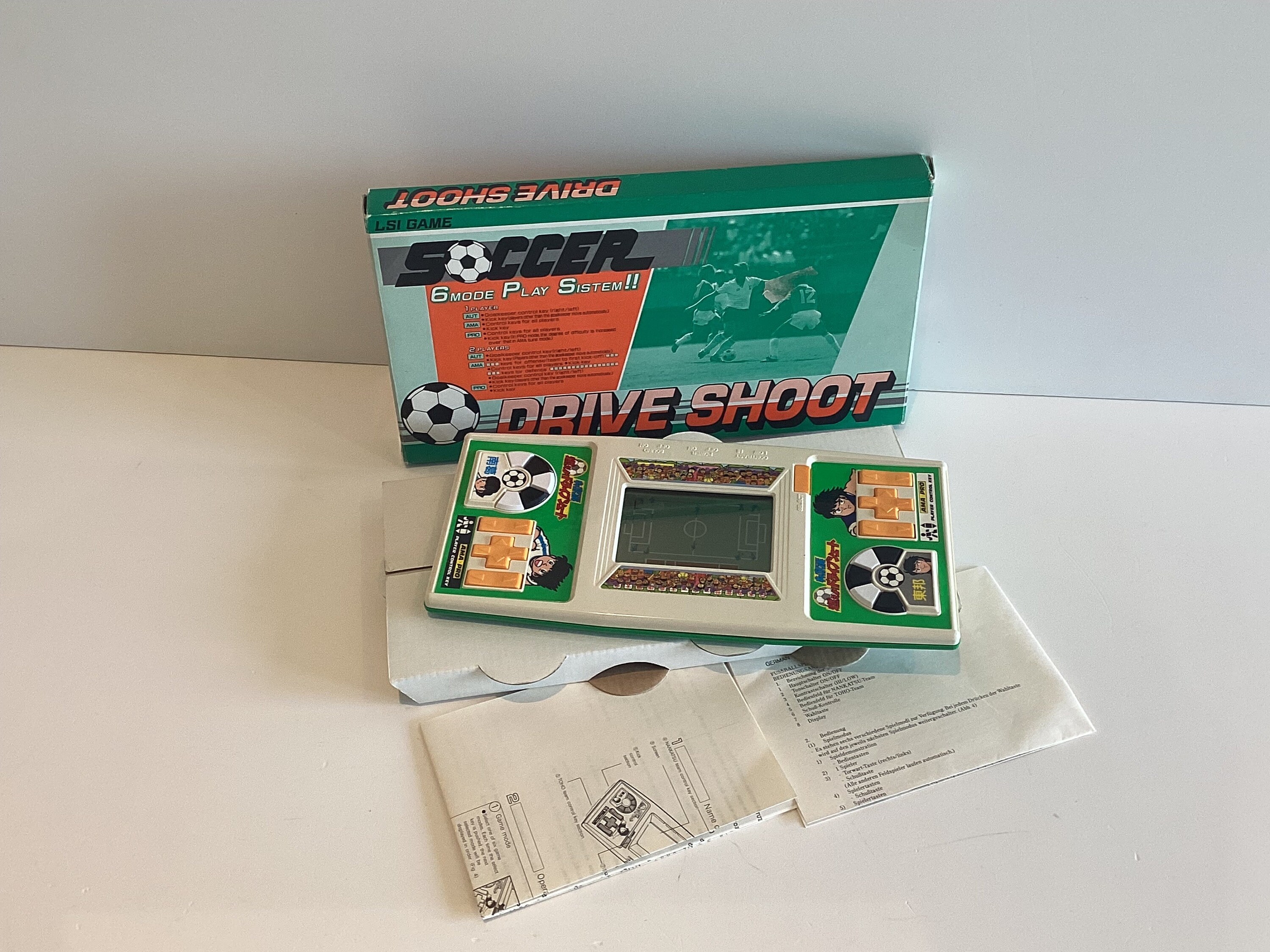 Vintage Handheld Game | 1984 Bandai Japan LSI Soccer Drive Shoot, Complete in Box — photo 2 of 7